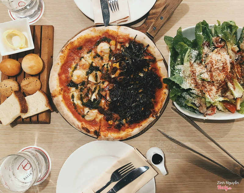 Half seafood pesto half teriyaki chicken pizza & Caesar salad