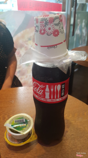 Coke, disposable cup and vinyl gloves. It is a kind of our Korean's culture !