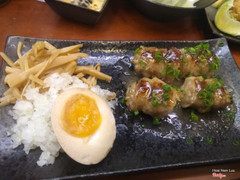 Omakase last plate. Pork belly wrapped ramen with house menma and onions, soy egg.