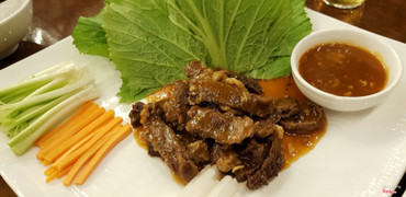 Bò cuộn cải xanh