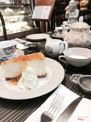 Mango cheesecake with pot of tea for two