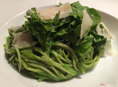 Creamy Pesto topped with shaved Parmesan