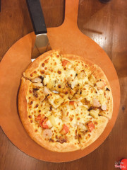 Pizza hải sản sốt tiêu den size vừa thấy hơi nhỏ hơn bình thường 