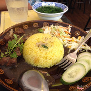 Com Bo Nam Ham Tieu Den. Flavored Rice with Black Pepper Flavored Beef & Mushrooms, Along with some Cucumber & a Mini Salad 40k