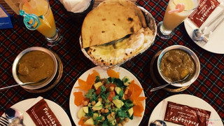 Roti, cheese nan, beef and chicken curry, chicpea salad