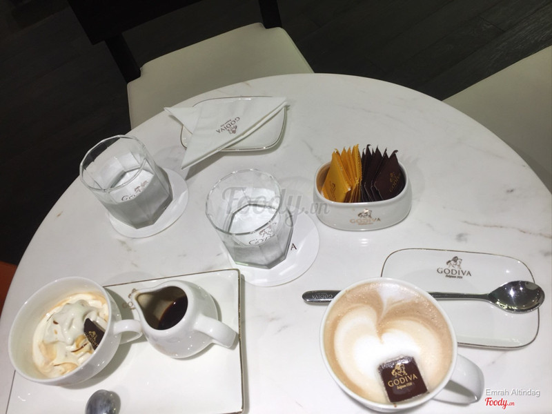 Vanilla ice cream and hot orange drink