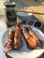 Grilled squids by the sea