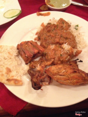 Tandoori chicken, jeera rice, garlic naan, chicken masala. 