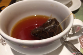 Earlgrey hot tea with 2 honey sticks