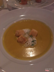 Pumkin soup with croutons and creamy foam