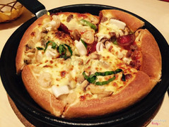 A half seafood pesto - a half supreme meat love