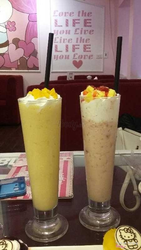 Fresh mango Smoothie + Fresh strawberry and pineapple smoothie