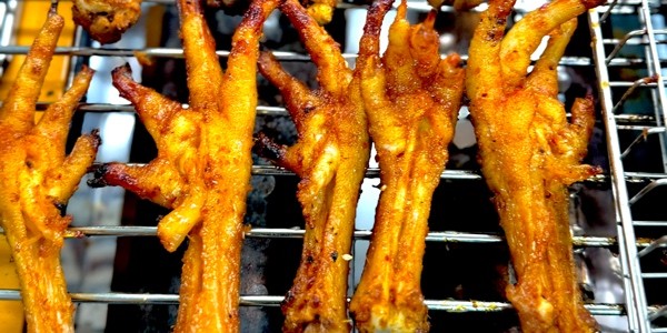 Tiệm Ăn Vặt Trứng Nướng & Chân Gà Sốt Thái - Đê La Thành